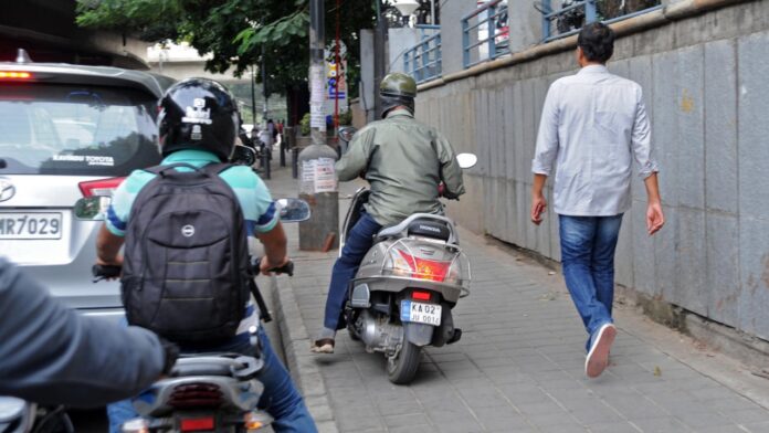 in bangalore vehicles on footpath