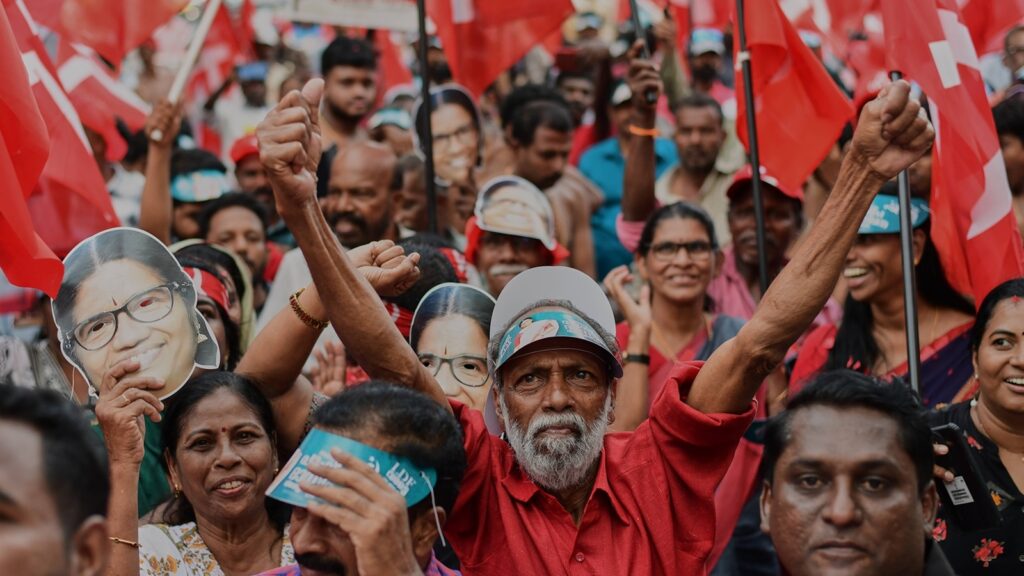 LDF supporters at a public meeting in Kochi on Tuesday. AP